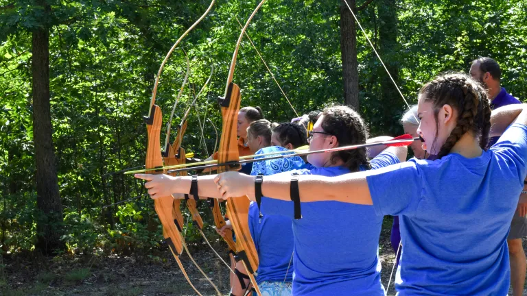 People shooting arrows