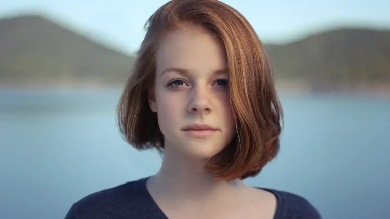 young woman looking straight at the camera