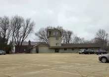 A tan-colored meeting hall
