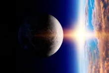 La lune et la terre et le soleil sur l'horizon